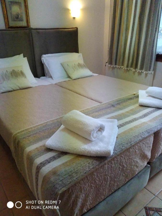 Menelaos Apartments เลโฟกาสโตร ภายนอก รูปภาพ